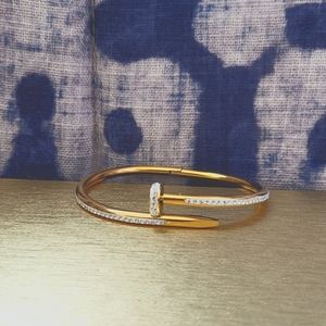 Designer inspired nail bracelet. Brand new.